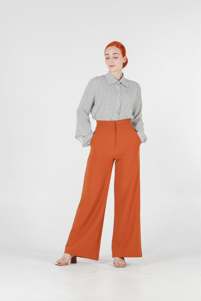 1- High waisted pants in burnt orange
