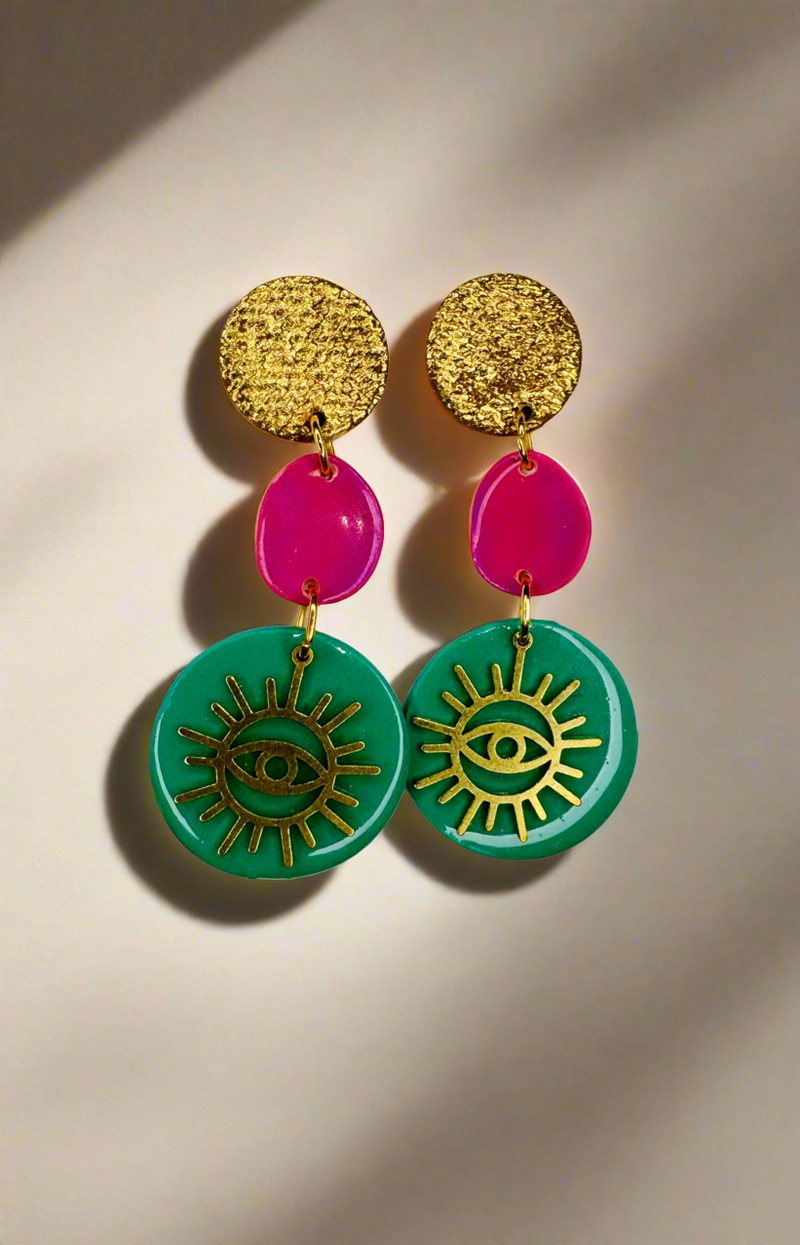 1- Long green eye earrings