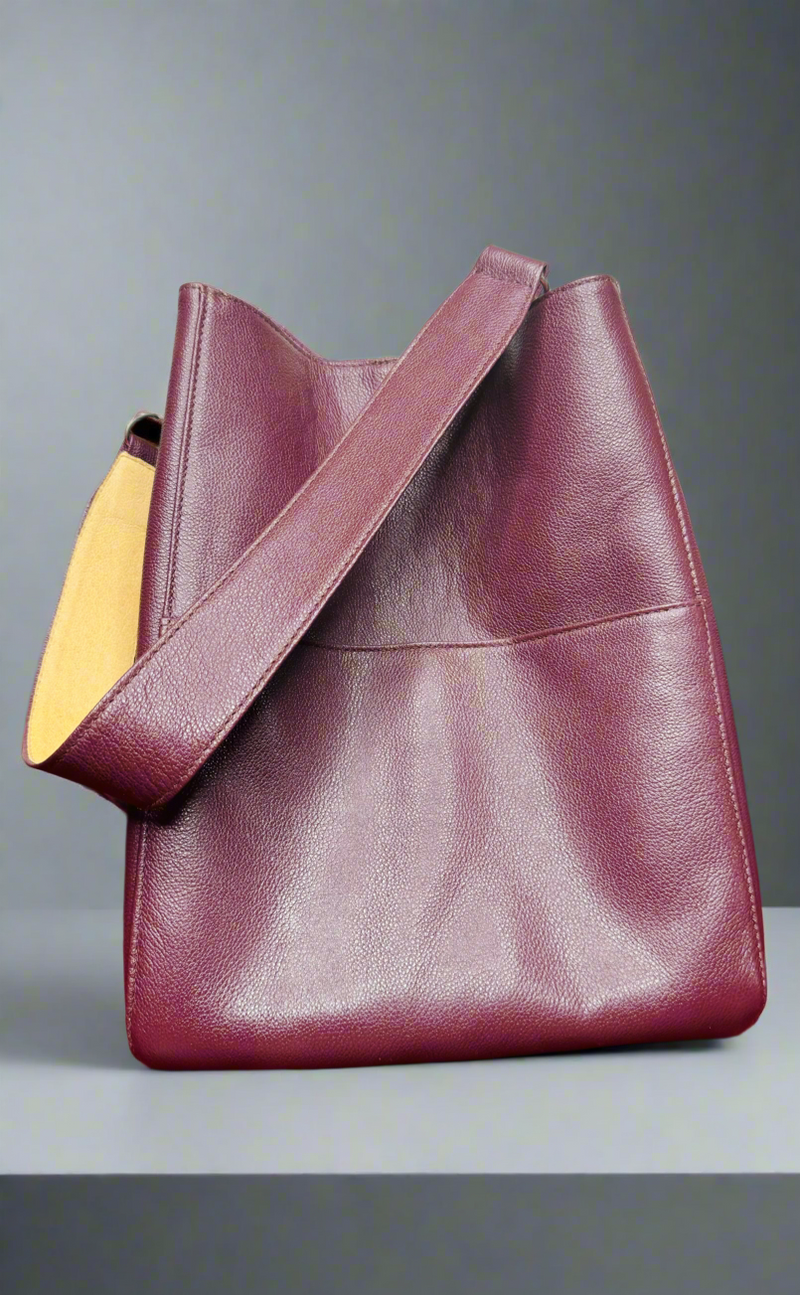 1- Bucket bag in burgundy by Pessoa