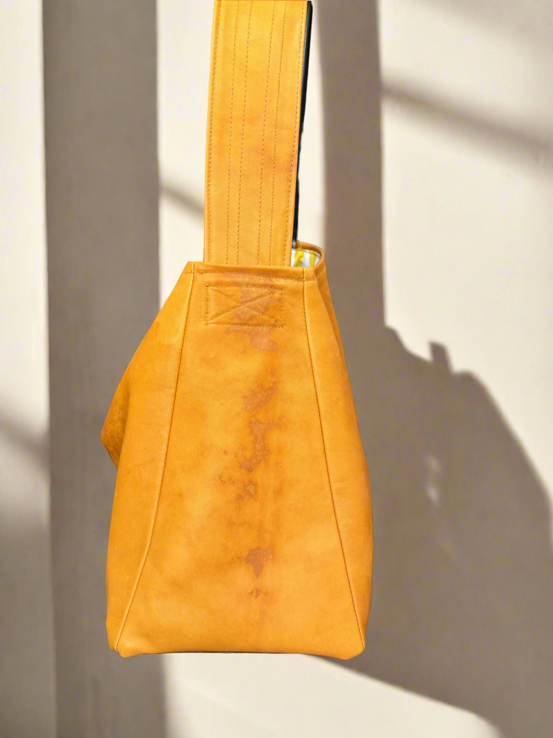 1 - Camel and black leather bucket bag