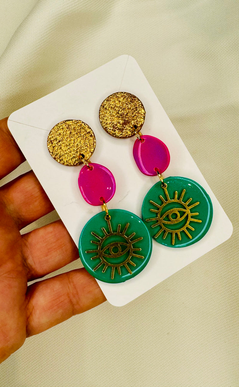 1- Long green eye earrings