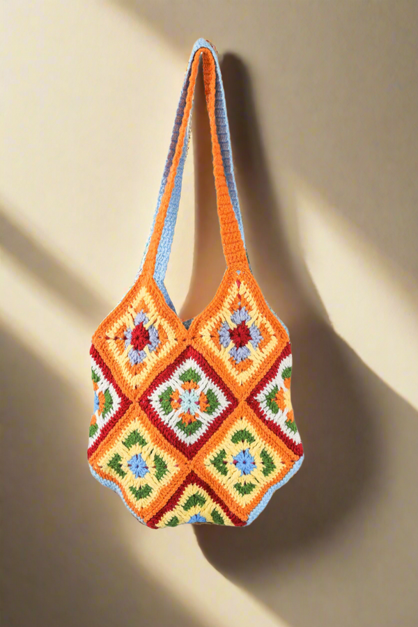 Handmade crochet bag in orange and blue