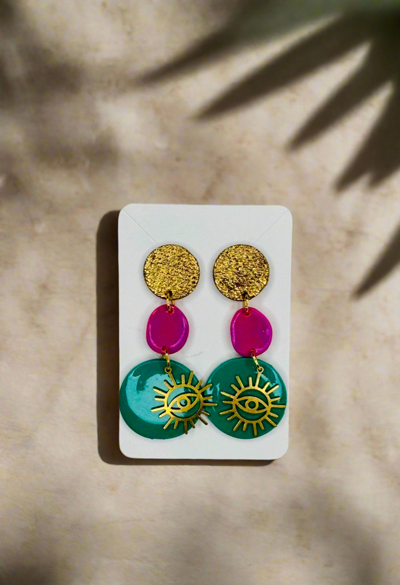 1- Long green eye earrings