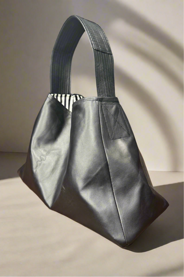 1- Black leather bucket bag