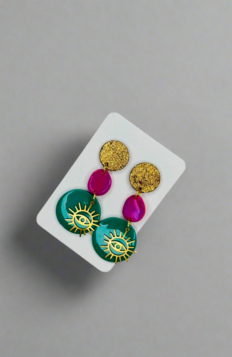 1- Long green eye earrings