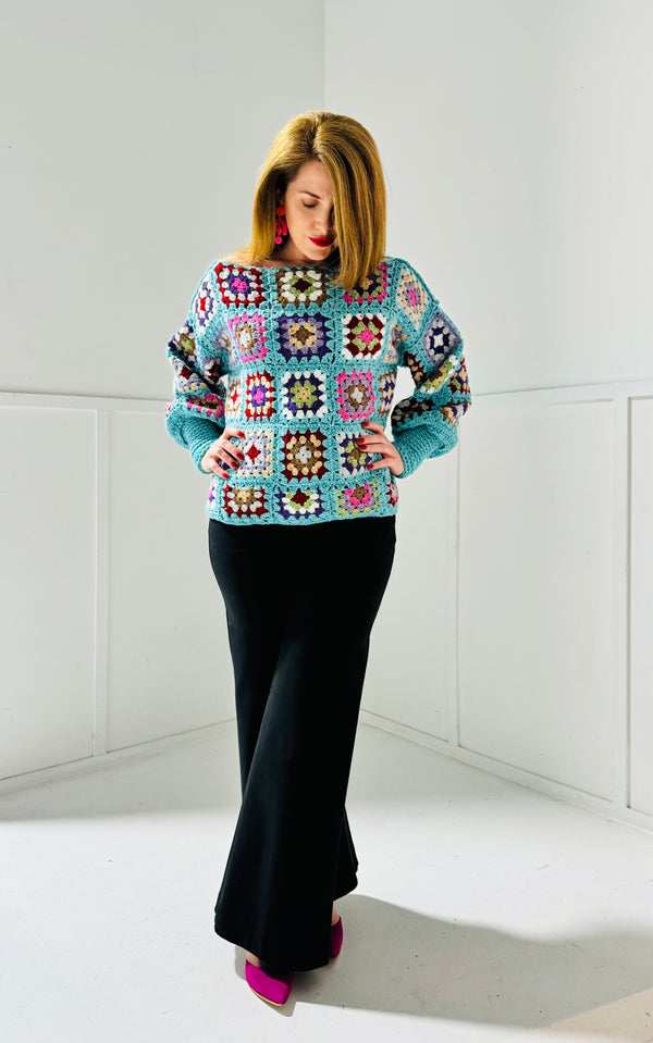 Handmade crochet jumper in turquoise blue