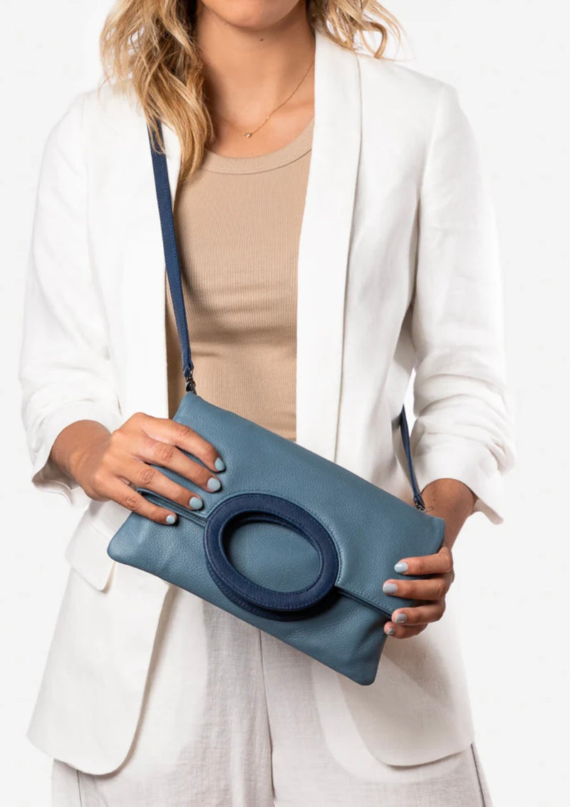 1- Cloud leather clutch in blue by Pessoa