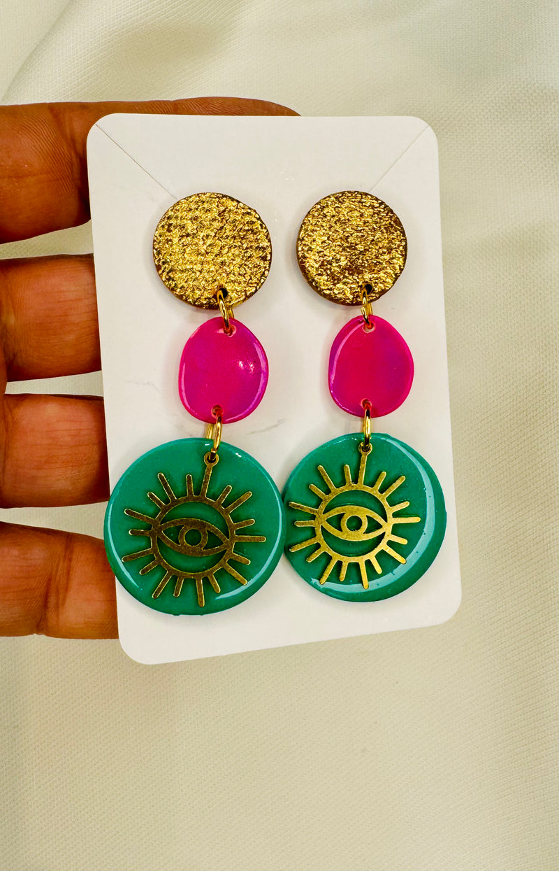 1- Long green eye earrings