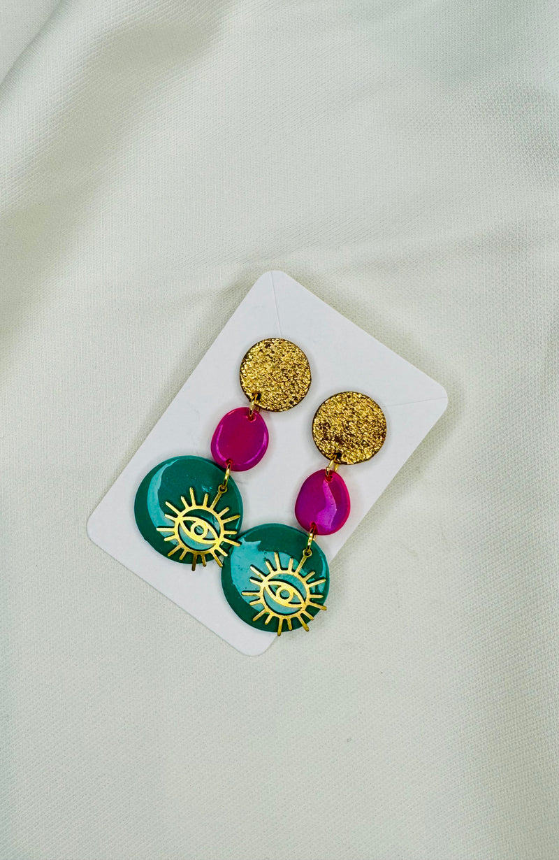 1- Long green eye earrings