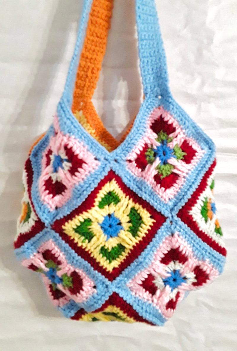 Handmade crochet bag in orange and blue