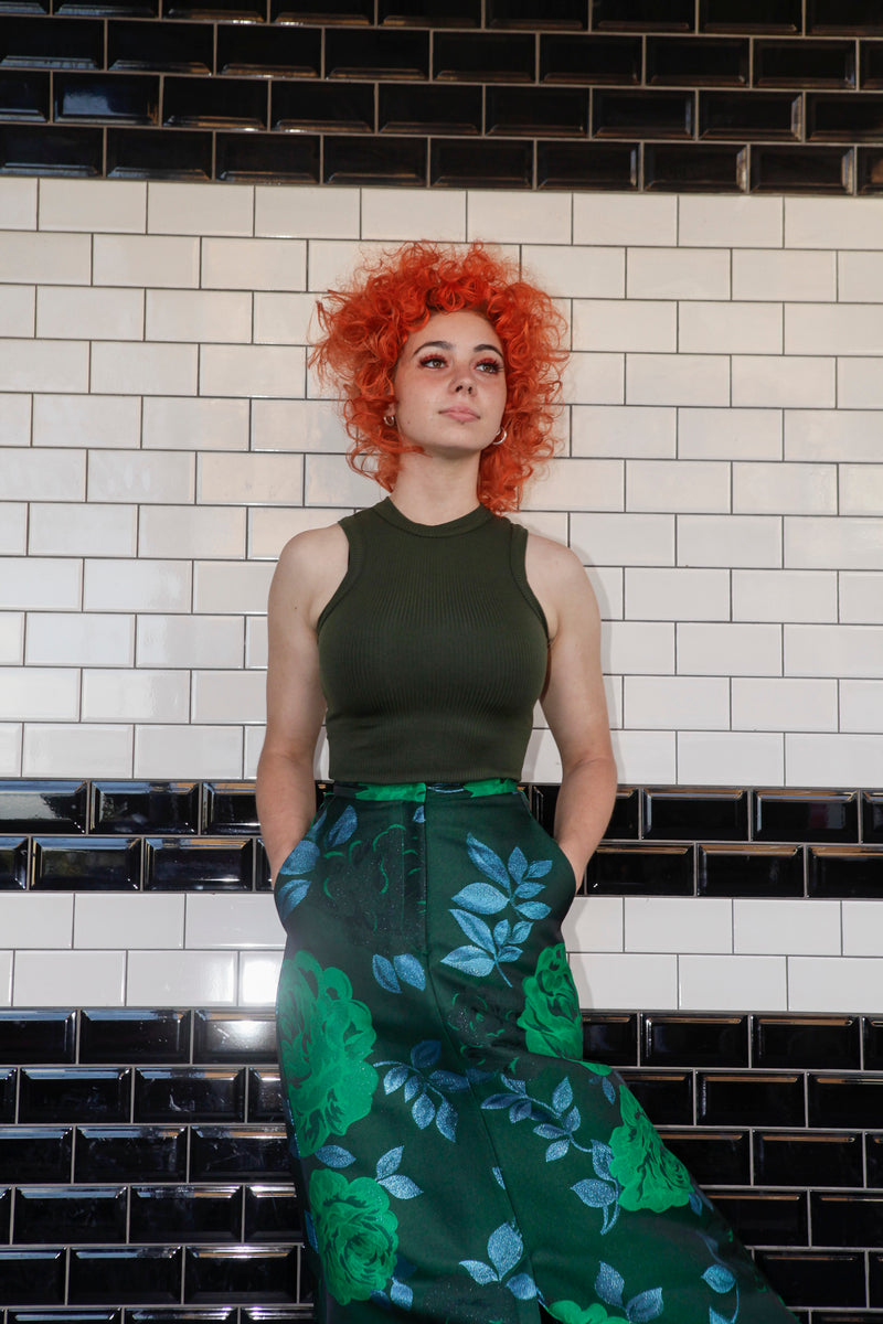 Green singlet by Natalija Rushidi