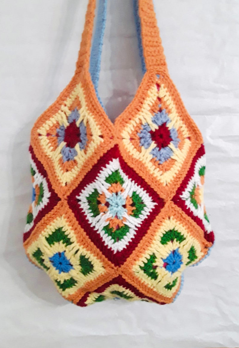 Handmade crochet bag in orange and blue
