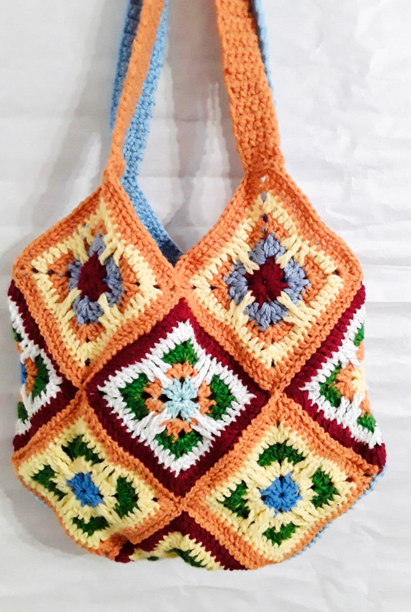 Handmade crochet bag in orange and blue