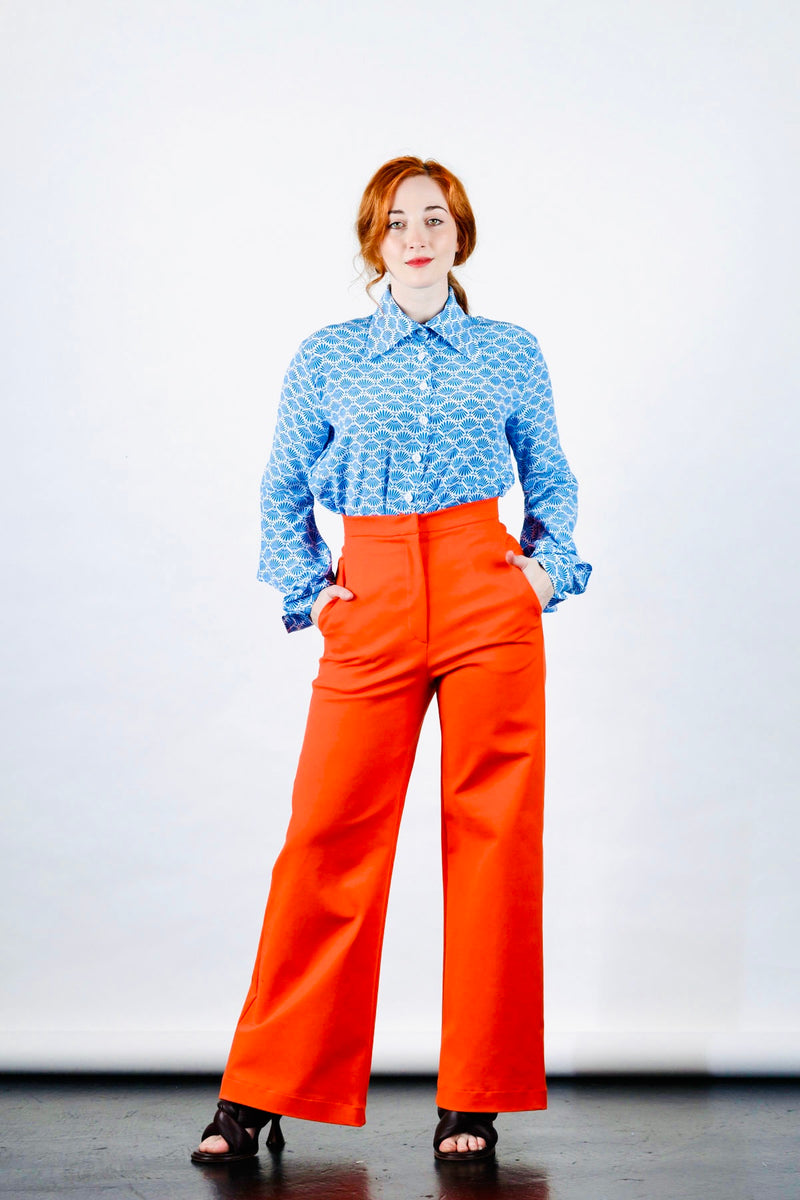 1- Orange high waisted pants by Natalija Rushidi