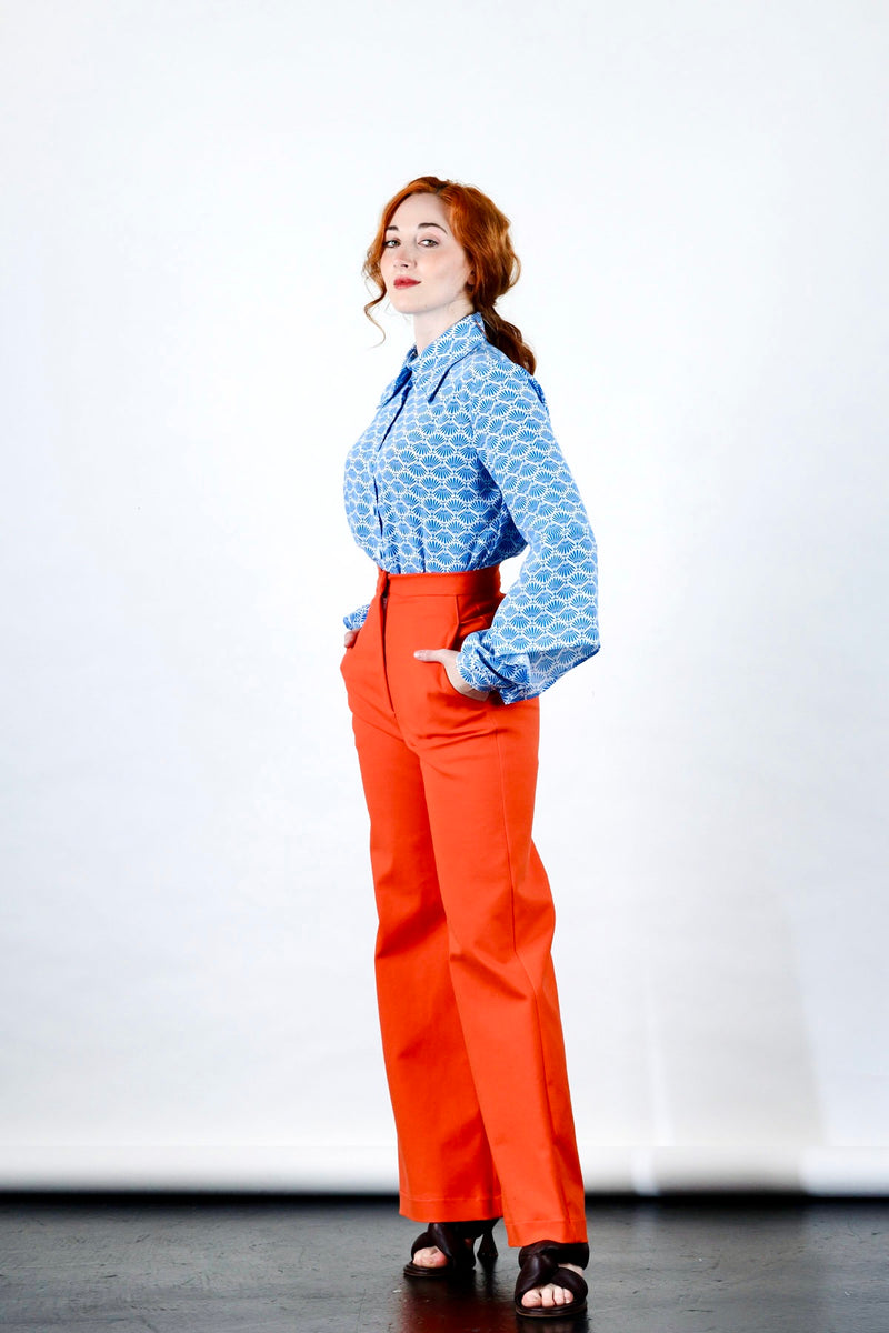 1- Orange high waisted pants by Natalija Rushidi