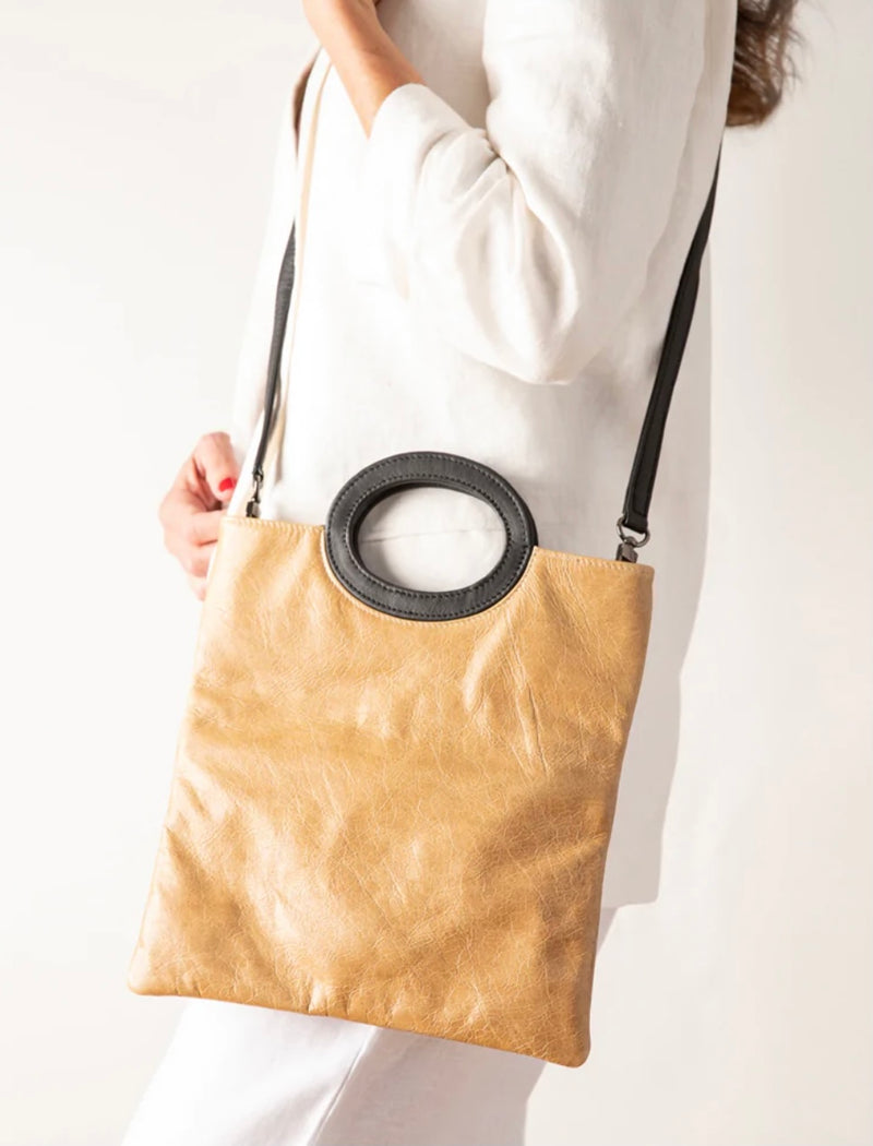 Cloud leather clutch in light camel by Pessoa