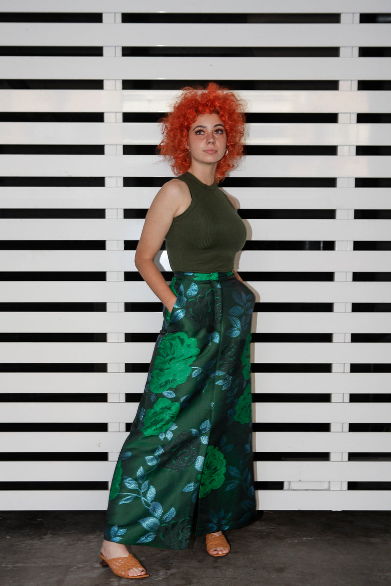 Green singlet by Natalija Rushidi