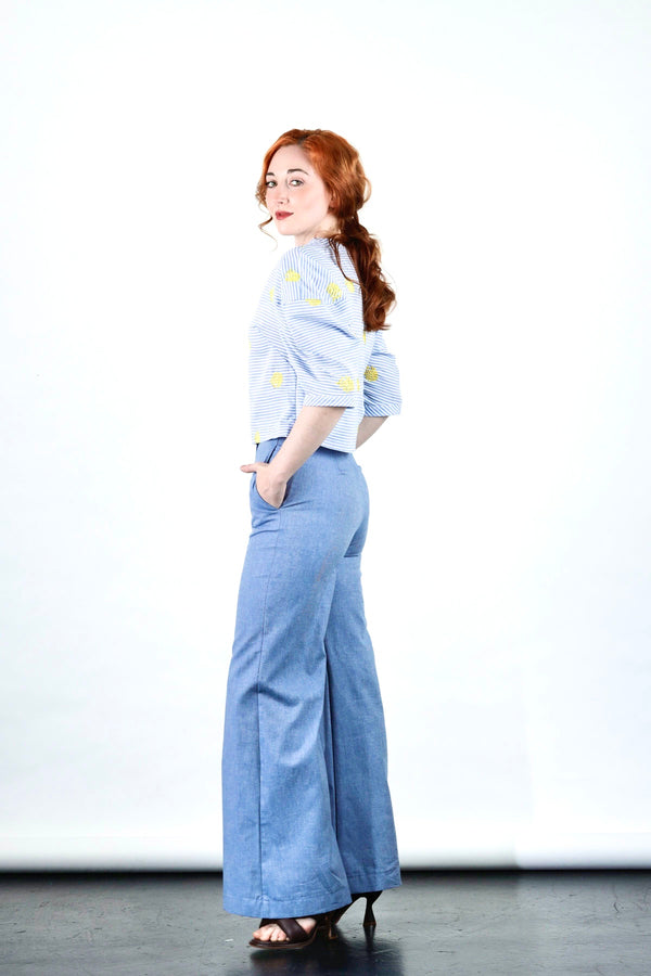 1- Blue light denim pants with scalloped waistband