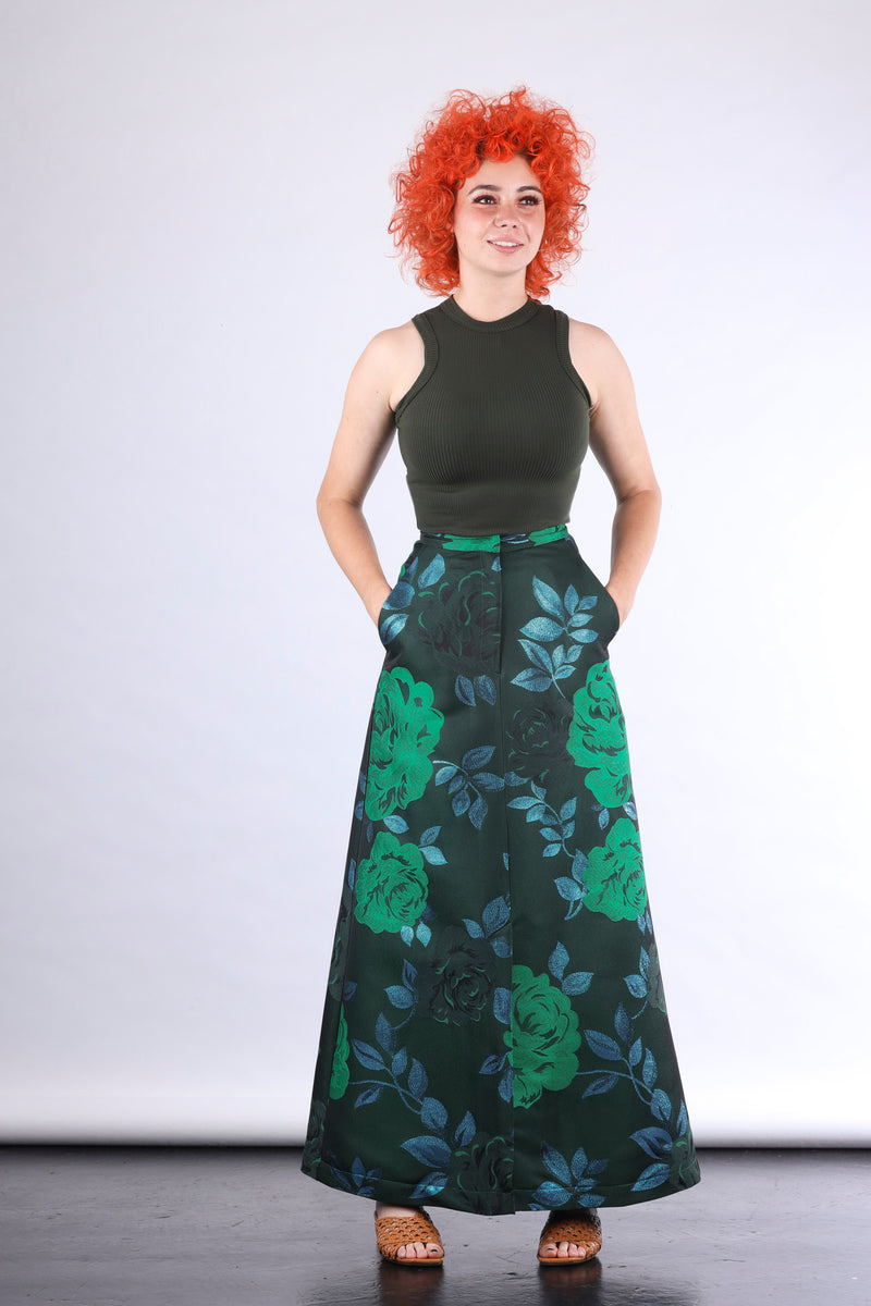 Green singlet by Natalija Rushidi