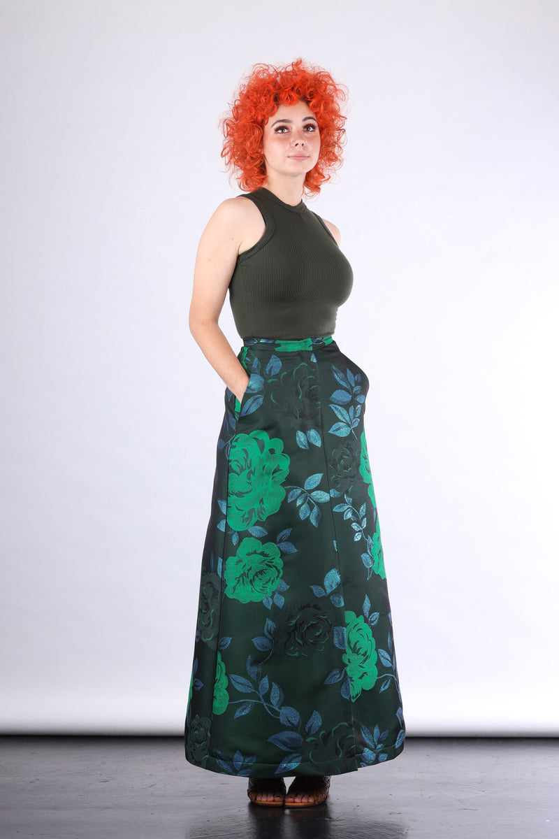 Green singlet by Natalija Rushidi