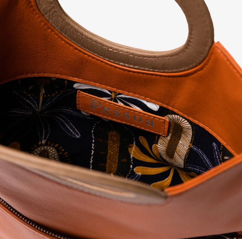 Cloud leather clutch in burnt orange by Pessoa