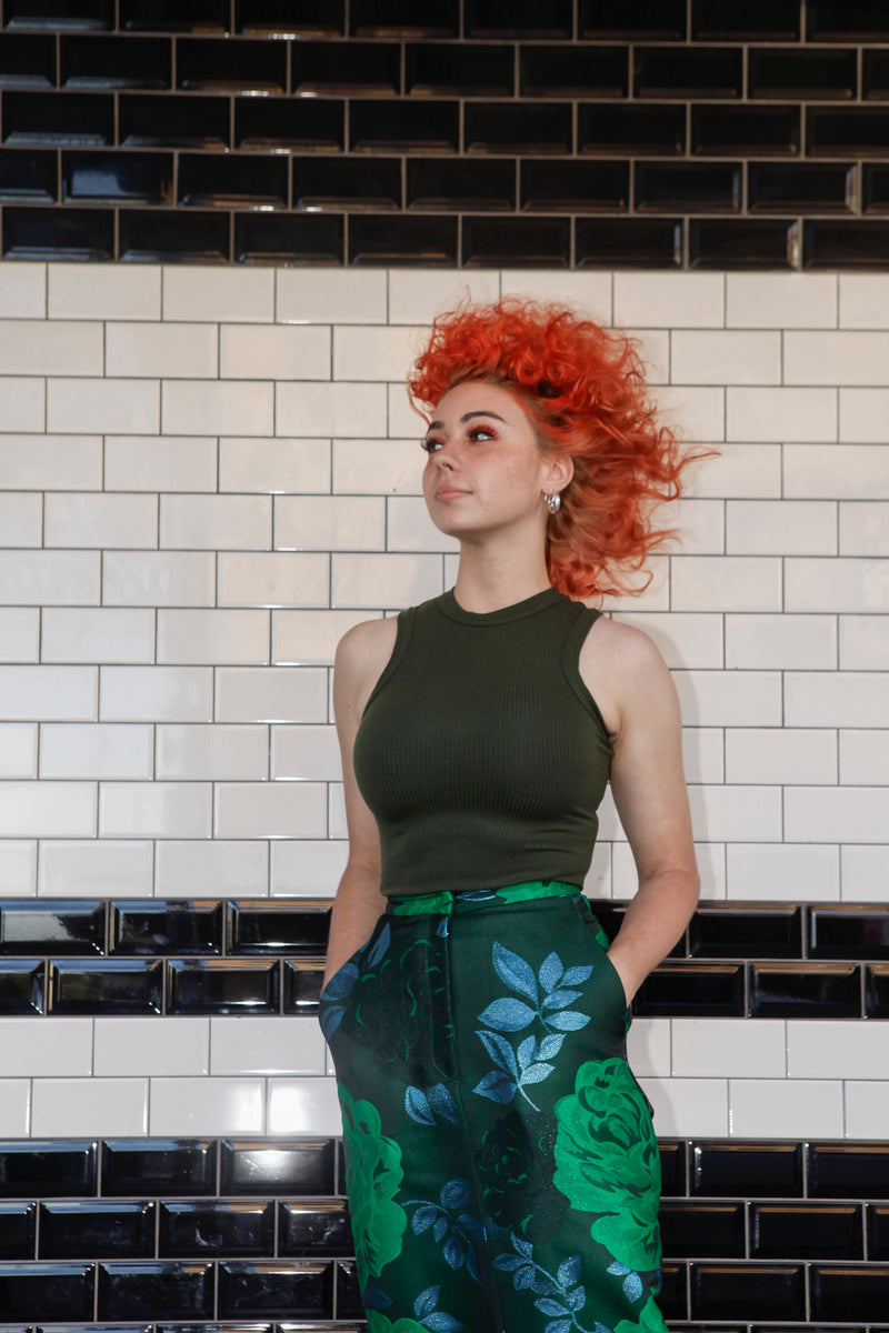 Green singlet by Natalija Rushidi