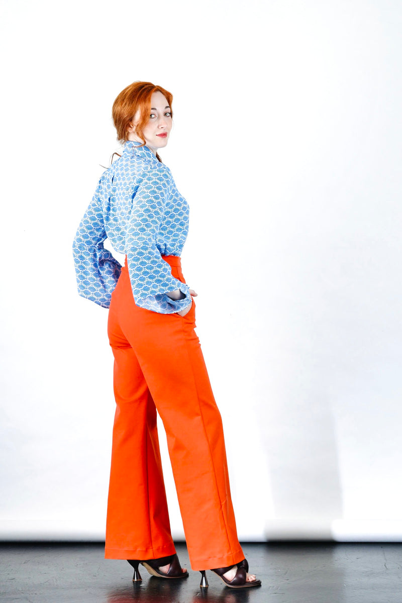 1- Orange high waisted pants by Natalija Rushidi